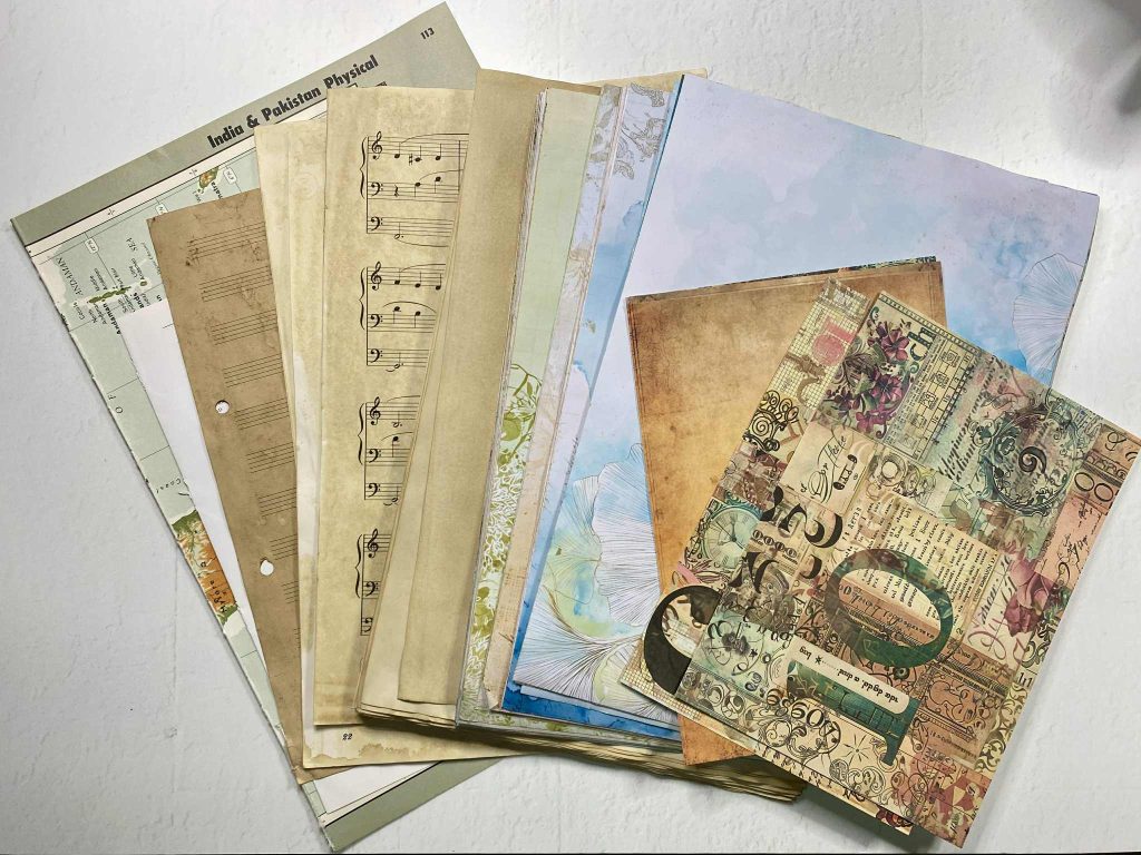 map pages, tea dyed paper, digital prints, scrapbook paper all work great in a boho journal
